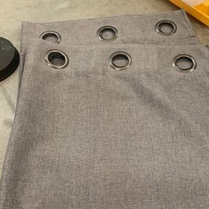 Pair of gray grommet panel curtains